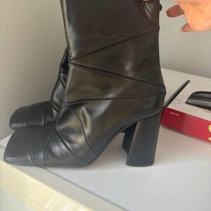 Chic Black Leather Heeled Boots